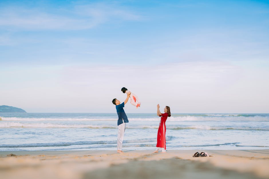 A joyful family bonding on a sunny beach, capturing a beautiful moment of happiness.