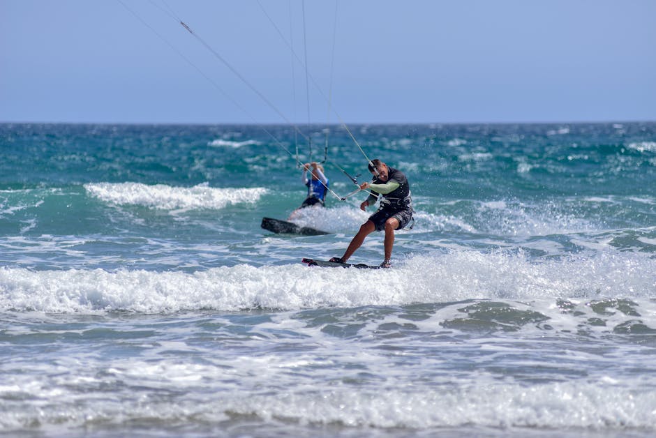 Thrilling wakeboarding experience with two men on the sea waves in Gran Canaria, Spain.